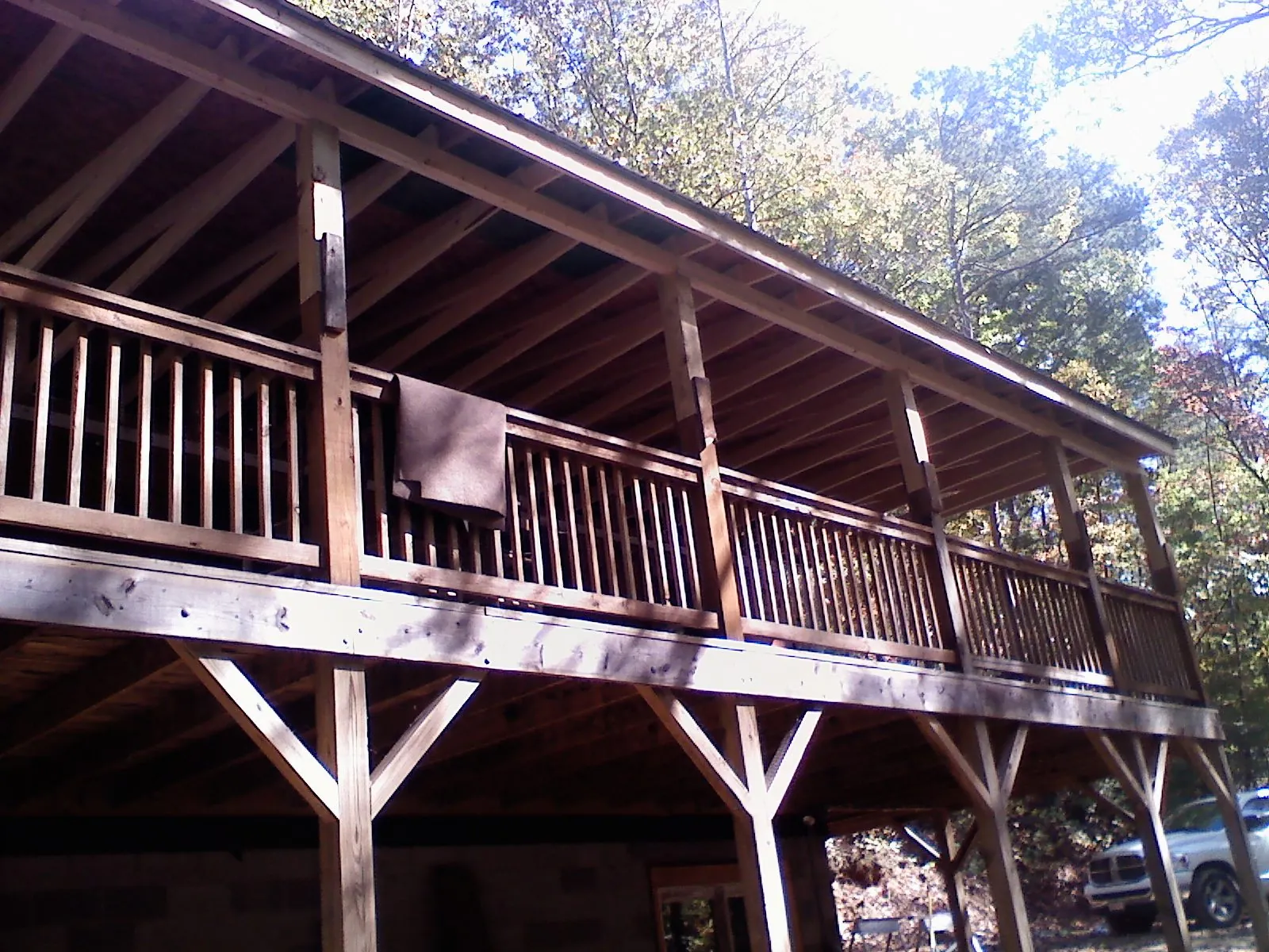 Timber framing under a new elevated porch and deck — Roof Leak Repair in Alder by Roofing Brothers